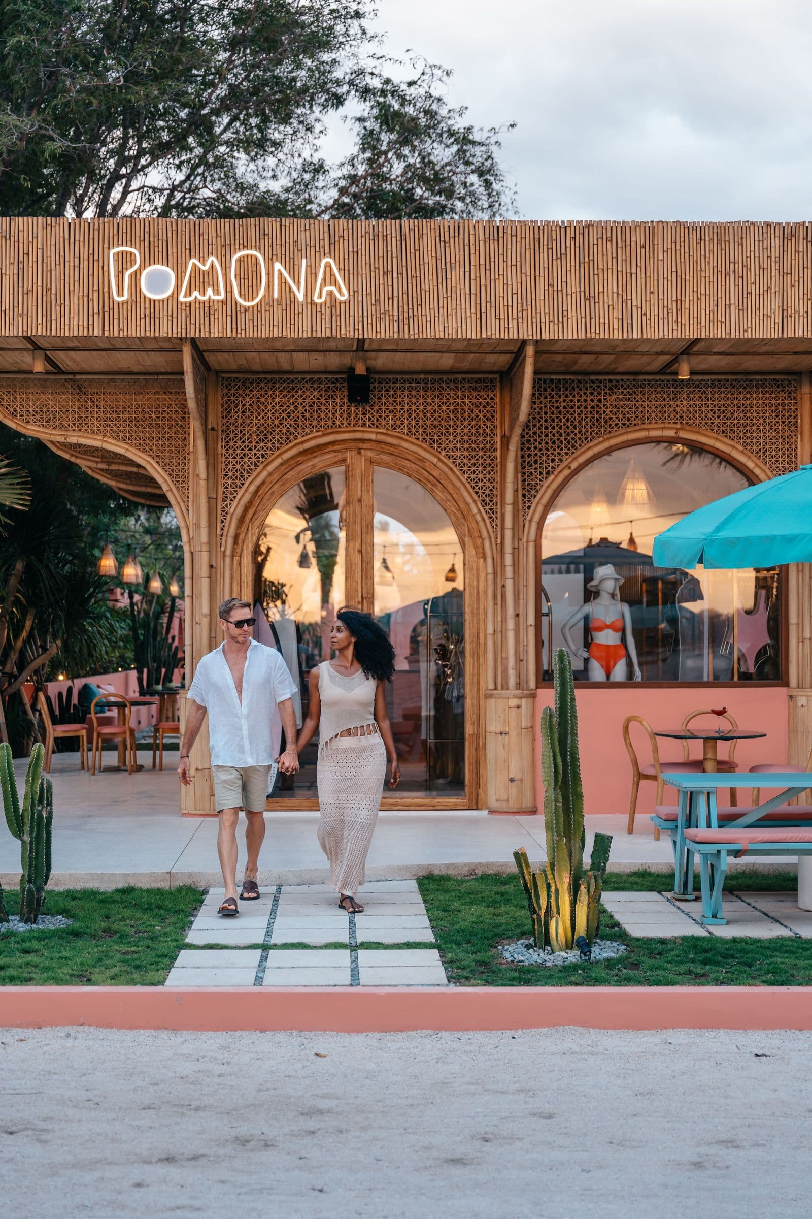 The Pomona sign lit at dusk
